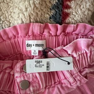 Pink High Rise Jean shorts with ruffled top!